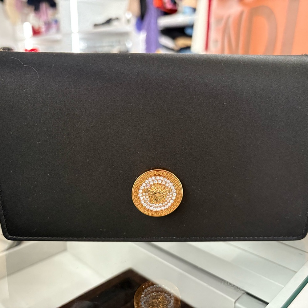 Elegant Black Clutch with Gold Accent
